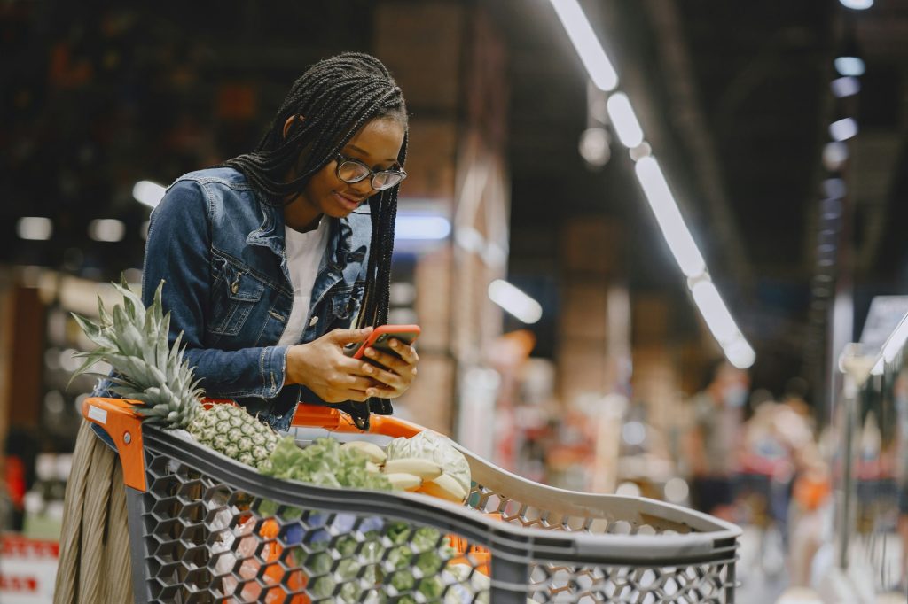 Woman shopping vegetables at the supermarket