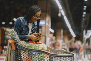 Woman shopping vegetables at the supermarket